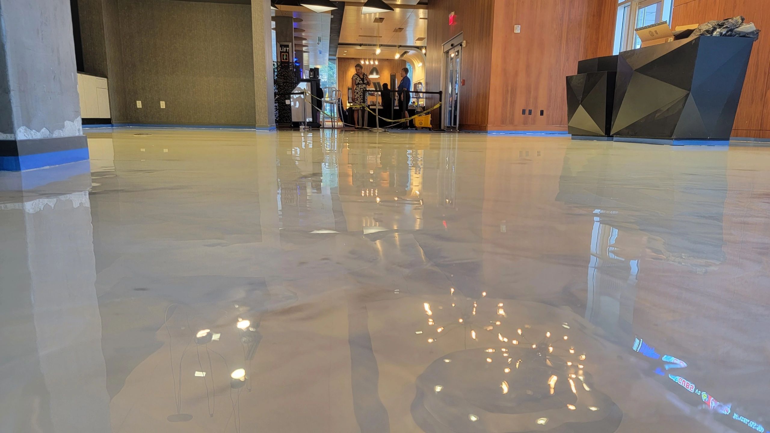 Modern interior with blue accent epoxy floor